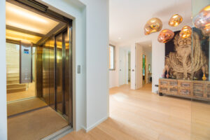 Entrance hall with elevator of a luxury villa in Ibiza